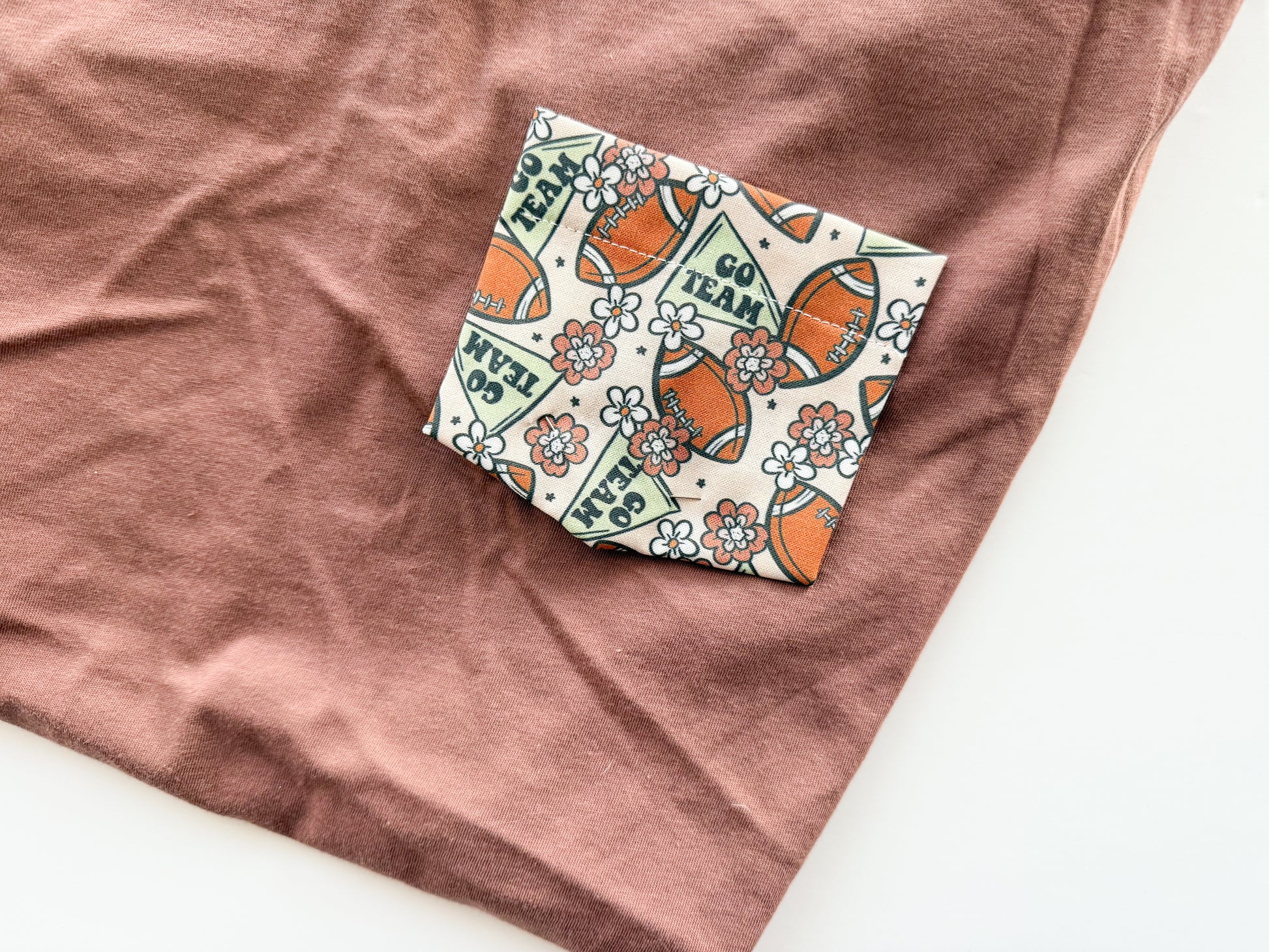 Football Flower Pocket Tee